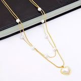 Elegant 18K gold-plated double layered heart necklace featuring synthetic pearls and a heart pendant for timeless luxury styling.