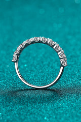 1 Carat Moissanite Half-Eternity Ring in rhodium-plated 925 sterling silver featuring sparkling round-cut moissanite stones along a polished silver band.