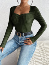 Woman wearing the Honey Ribbed Long Sleeve Sweetheart Neck Top in army green with light wash jeans and a black belt, stylish ribbed women's top from Chic Mystik Boutique.