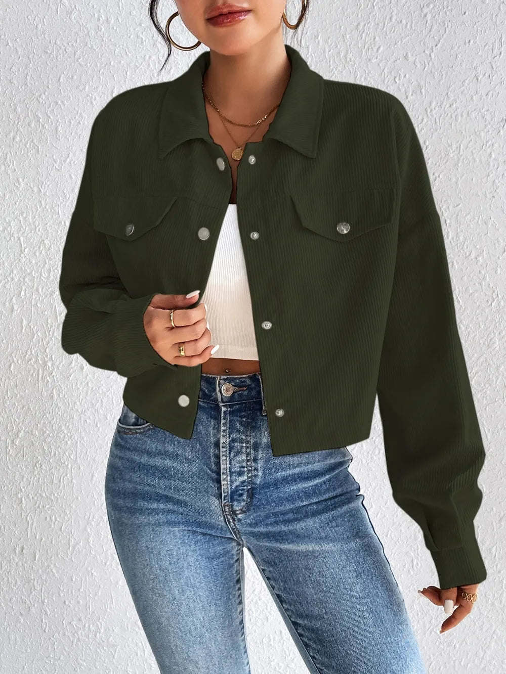 Woman wearing the Honey Snap Down Long Sleeve Jacket in army green with blue jeans and a white top, lightweight women's fall jacket from Chic Mystik Boutique.