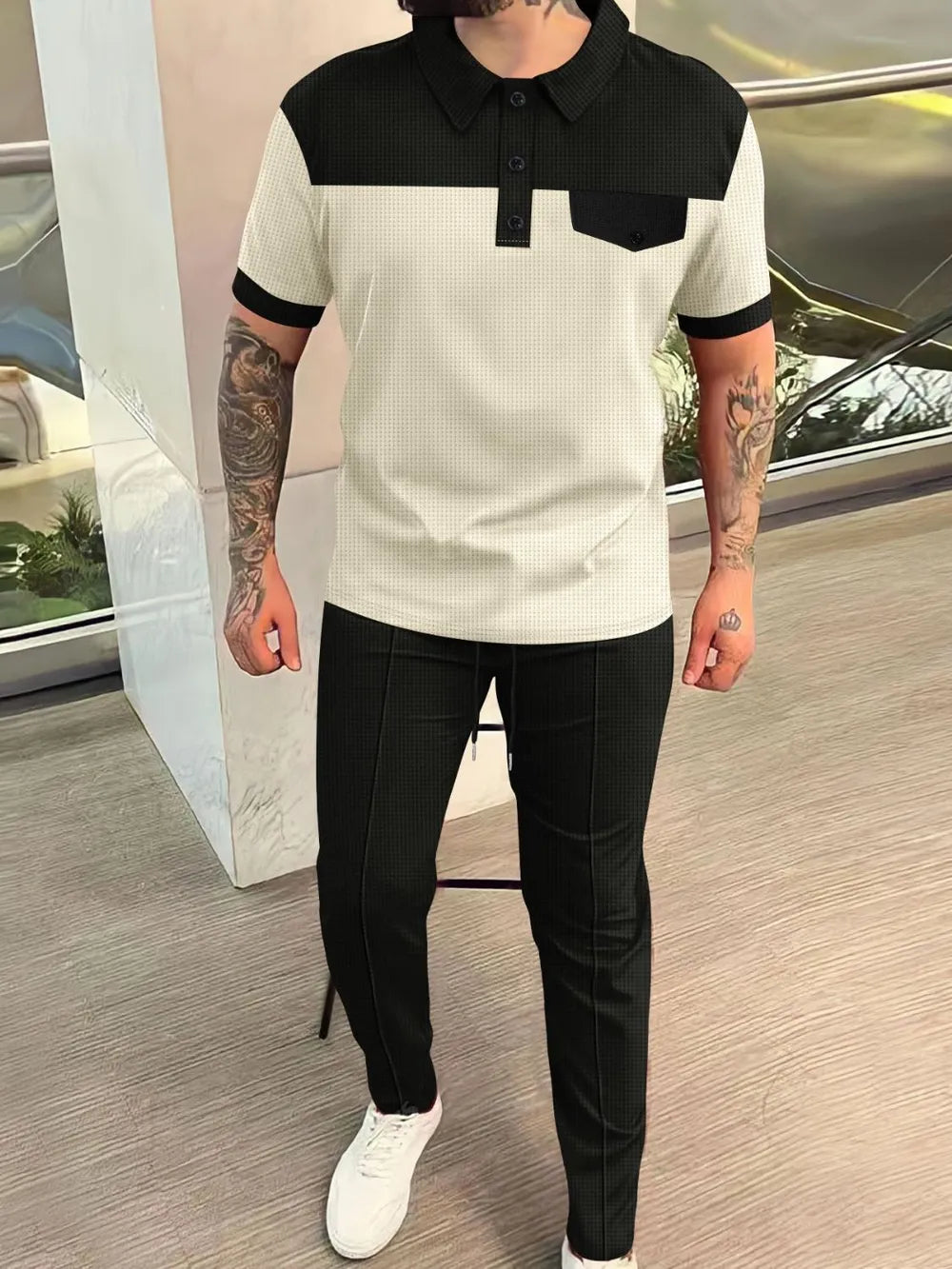 Men’s plus size beige and black waffle-knit contrast short sleeve top and pants set, available in sizes Small–3XL.