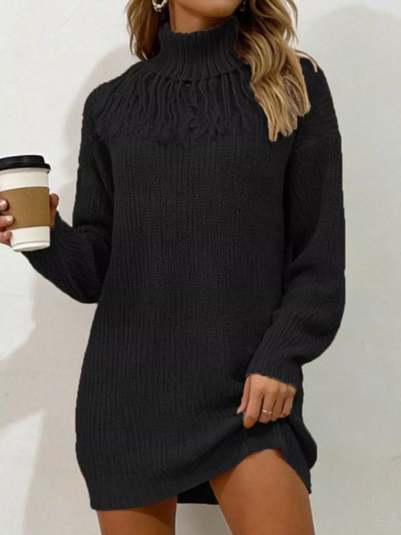 Black plus size turtleneck sweater dress with fringe neckline and long sleeves