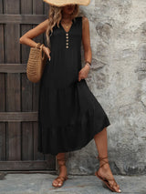 Woman wearing the Ivy Lane decorative button sleeveless dress with a notched neckline and a flattering silhouette.