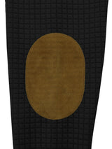 Men’s black waffle-knit hoodie with black hood, brown contrast shoulder panels and drawstring