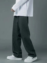 Men’s black washed wide leg relaxed fit jeans in extended sizes Small–3XL.