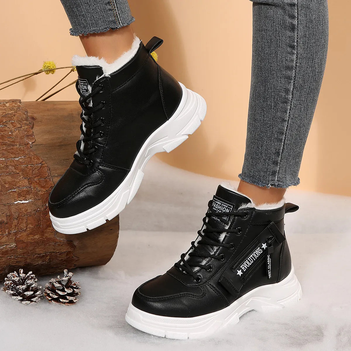 Women’s fleece-lined lace-up combat boots with chunky rubber sole and side detail, available in khaki, black and white.