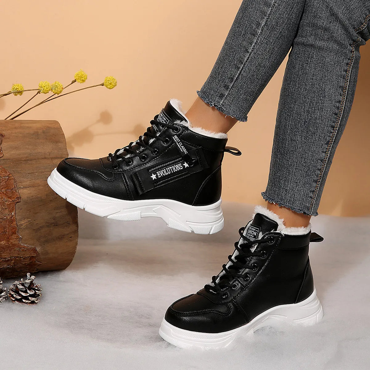 Women’s fleece-lined lace-up combat boots with chunky rubber sole and side detail, available in khaki, black and white.