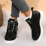 Women’s fleece-lined lace-up combat boots with chunky rubber sole and side detail, available in khaki, black and white.