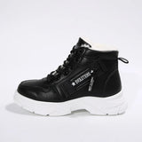 Women’s fleece-lined lace-up combat boots with chunky rubber sole and side detail, available in khaki, black and white.