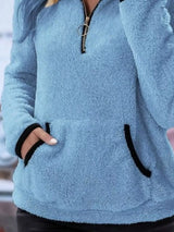 Cozy up in this full-size fleece quarter zip sweatshirt with pockets. Slightly stretchy and available in 11 colors and sizes Small–3XL for easy everyday style.