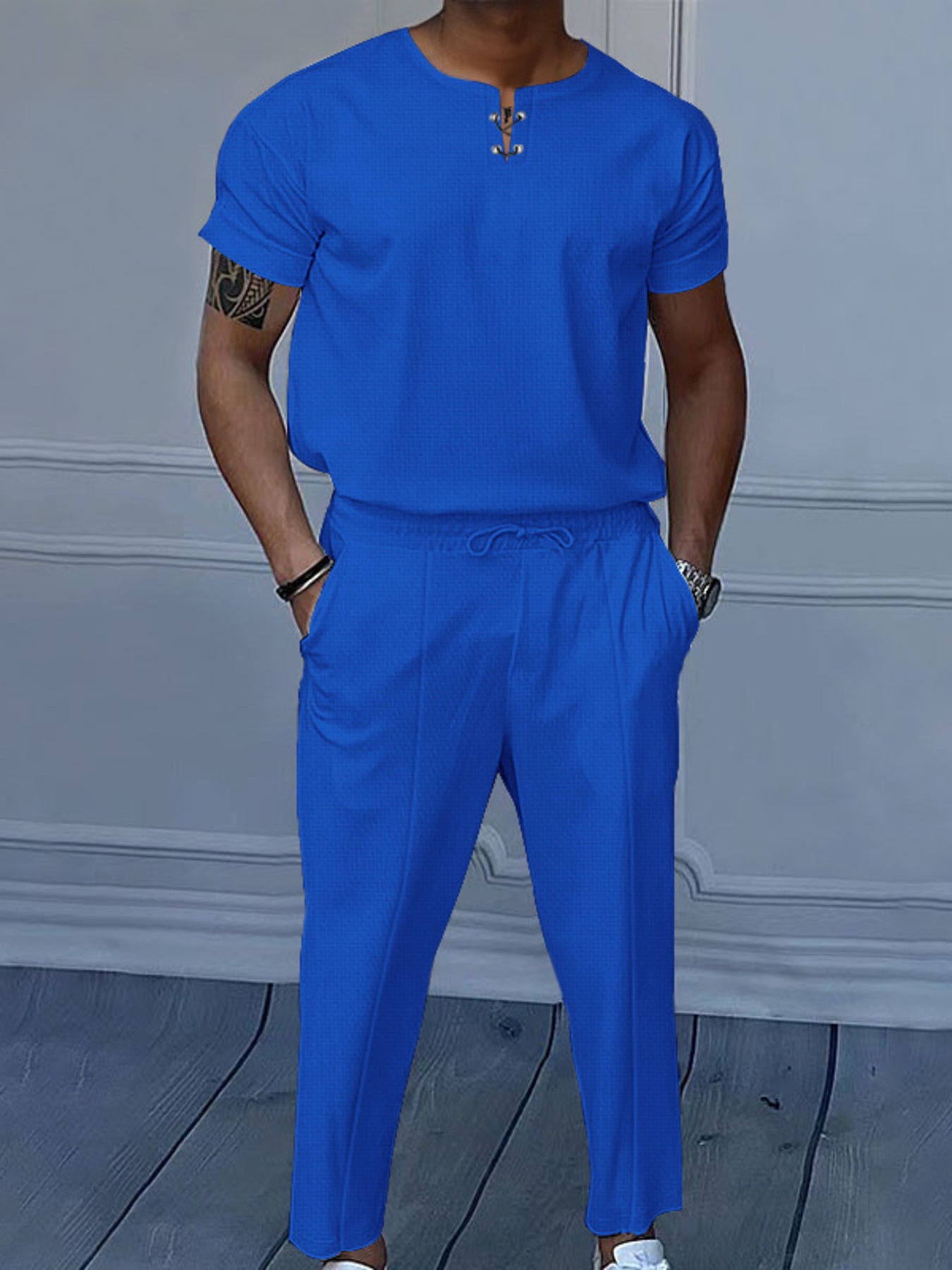 Men's blue short-sleeve top and matching pants two-piece casual set with white sneakers, available in sizes Small–3XL.