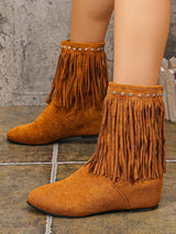 Brown suede ankle boots featuring layered fringe and silver stud detailing around the ankle with a comfortable low heel.