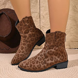 Women's brown leopard print western ankle boots featuring suede material, pointed toes, low block heels and side zipper detail.