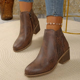 Women’s point toe block heel ankle boots with perforated side detail in brown.