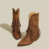 Brown suede Western boots with pointed toes, layered fringe, studded straps and low heels.