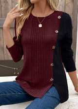 Women’s burgundy and black color block ribbed knit long sleeve top with decorative side buttons and slit detail, available in sizes Small–2XL.