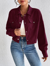 Woman wearing the Honey Snap Down Long Sleeve Jacket in burgundy with blue jeans and a white top, lightweight women's fall jacket from Chic Mystik Boutique.