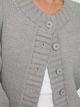 Women's gray button-down knit cardigan featuring a ribbed crew neckline, long sleeves, and relaxed fit. Cozy boutique sweater perfect for layering with jeans, dresses, or casual fall outfits.