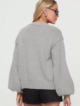 Women's gray button-down knit cardigan featuring a ribbed crew neckline, long sleeves, and relaxed fit. Cozy boutique sweater perfect for layering with jeans, dresses, or casual fall outfits.