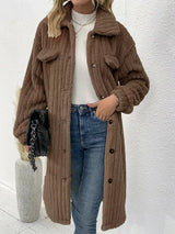 Women’s coffee brown textured button-down longline outerwear with pockets styled with a cream top and jeans