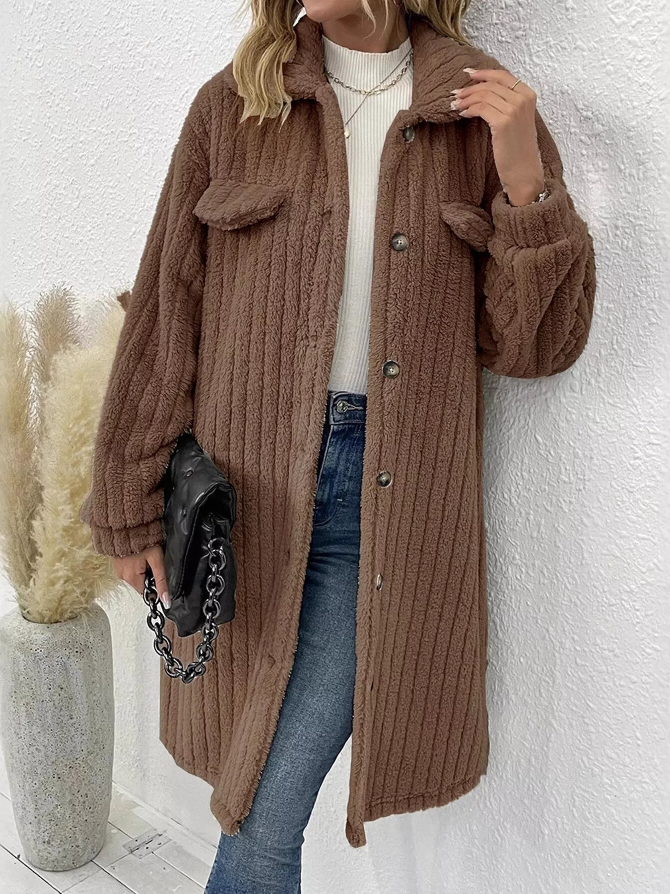 Women’s coffee brown textured button-down longline outerwear with pockets styled with a cream top and jeans
