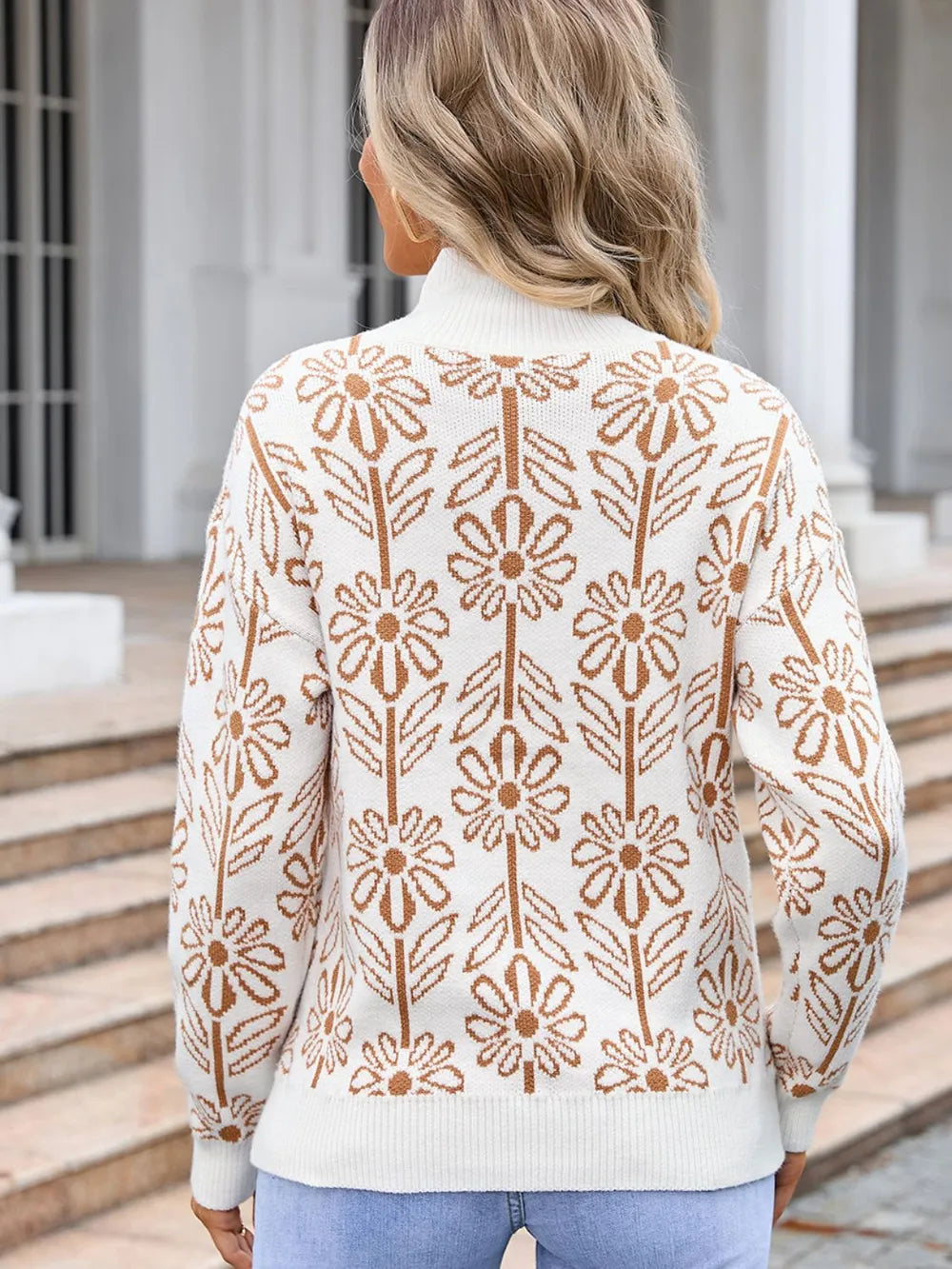 Women’s camel and cream floral turtleneck long sleeve sweater with allover flower pattern.