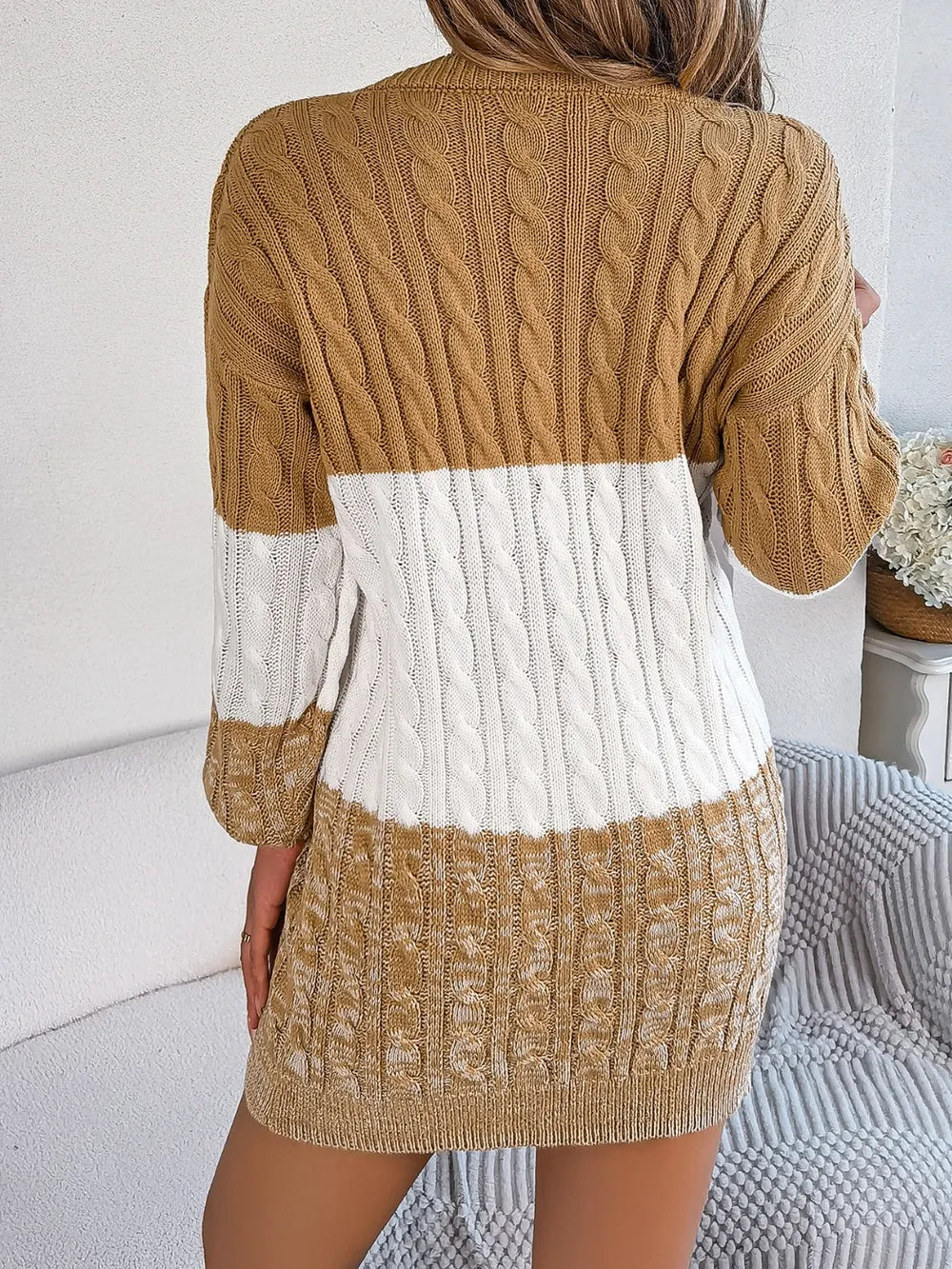 Women's camel cable-knit round neck color block sweater dress featuring long sleeves and cozy textured knit.