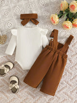 Baby girl three-piece outfit featuring a cream ribbed long-sleeve bodysuit with ruffled shoulders, caramel color bow-embroidered overalls and matching caramel color bow headband.