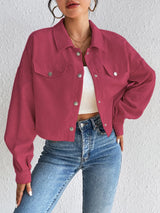 Woman wearing the Honey Snap Down Long Sleeve Jacket in cerise with blue jeans and a white top, lightweight women's fall jacket from Chic Mystik Boutique.