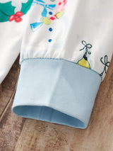 Children's white Christmas two-piece top and pants set with colorful snowmen, Christmas trees, stockings, ornaments, sleighs, and light blue cuffs.