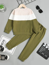 Children's olive green, cream, and beige color block long sleeve top with front chest pocket and matching olive-green pants, two-piece cotton blend outfit.
