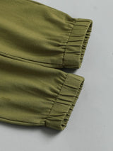 Children's olive green, cream, and beige color block long sleeve top with front chest pocket and matching olive-green pants, two-piece cotton blend outfit.