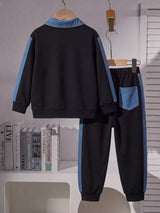 Children's navy two-piece outfit featuring a long sleeve polo shirt with denim-blue collar, AWESOME chest pocket and contrast sleeve stripes, paired with matching joggers.