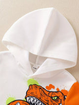 Children's white hooded sweatshirt with large orange dinosaur graphic and matching bright orange jogger-style pants.