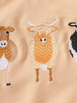 Children's two-piece farm animal outfit featuring a beige long-sleeve sweatshirt with embroidered cows and coordinating brown and cream cow-print drawstring pants.