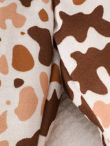 Children's two-piece farm animal outfit featuring a beige long-sleeve sweatshirt with embroidered cows and coordinating brown and cream cow-print drawstring pants.