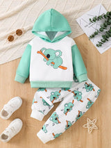Mint green and white children's two-piece outfit with koala graphic hooded sweatshirt and matching koala print pants.