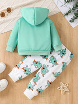 Mint green and white children's two-piece outfit with koala graphic hooded sweatshirt and matching koala print pants.