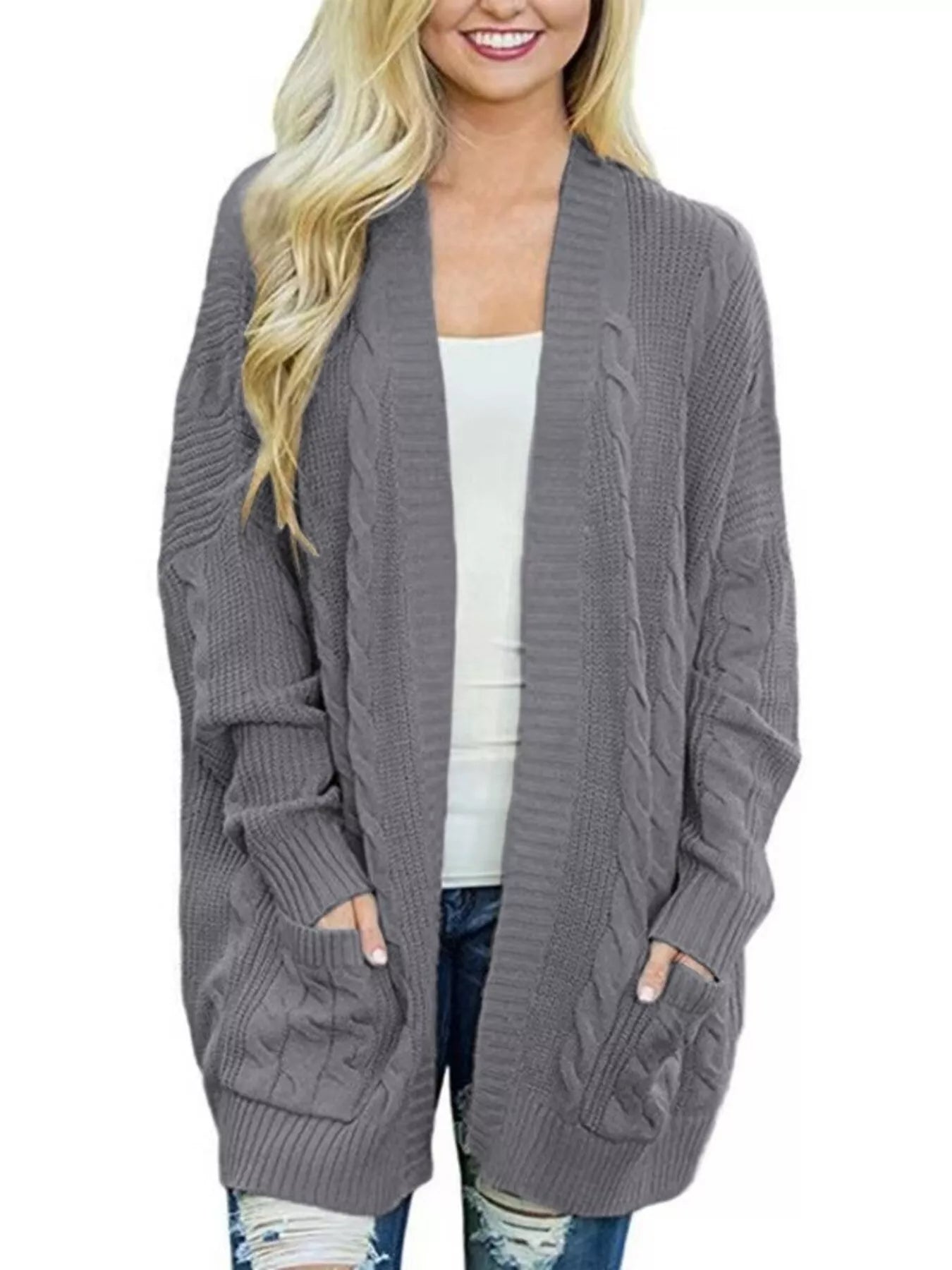 Women's chunky cable knit open front cardigan with front pockets in dark gray. Cozy fall sweater perfect for layering with jeans, dresses, leggings, and boots.