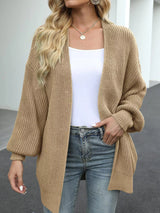 Women's oversized khaki chunky knit open front cardigan with long balloon sleeves, soft textured sweater perfect for fall layering with jeans.