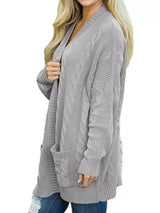 Women's chunky cable knit open front cardigan with front pockets in light gray. Cozy fall sweater perfect for layering with jeans, dresses, leggings, and boots.