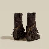 Coffee brown suede Western boots with pointed toes, layered fringe, studded straps and low heels.