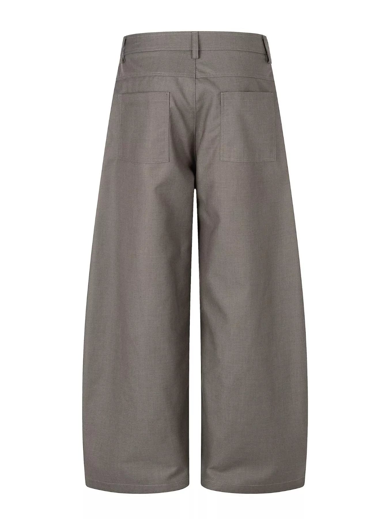 Men’s asymmetrical button wide-leg pants in coffee and black with pleated front and statement button detail.