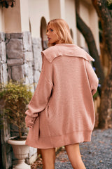 Women's burnt coral collared neck button-up cardigan with front pockets, oversized knit sweater layered over a black tank and denim shorts for stylish fall fashion.