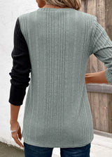 Women’s sage and black color block ribbed knit long sleeve top with decorative side buttons and slit detail, available in sizes Small–2XL.
