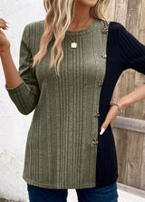 Women’s moss green and black color block ribbed knit long sleeve top with decorative side buttons and slit detail, available in sizes Small–2XL.