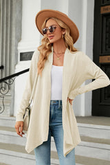 Women's Open Front Long Sleeve Cardigan in cream layered over a white tank and blue jeans, lightweight long cardigan for fall outfits, available in nine colors at Chic Mystik Boutique.