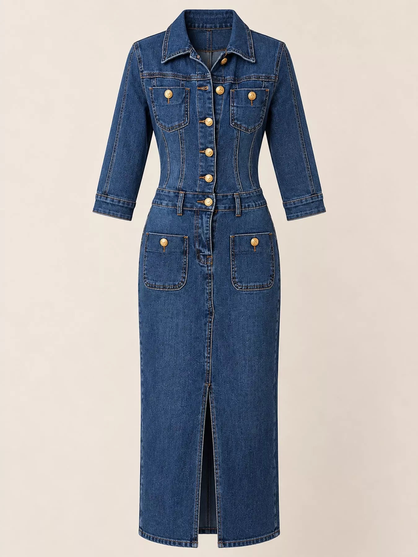 Woman wearing a dark blue button-front denim midi dress with gold-tone buttons, collared neckline, patch pockets, contrast stitching and front slit.