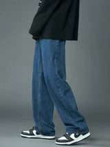 Men’s dark blue washed wide leg relaxed fit jeans in extended sizes Small–3XL.
