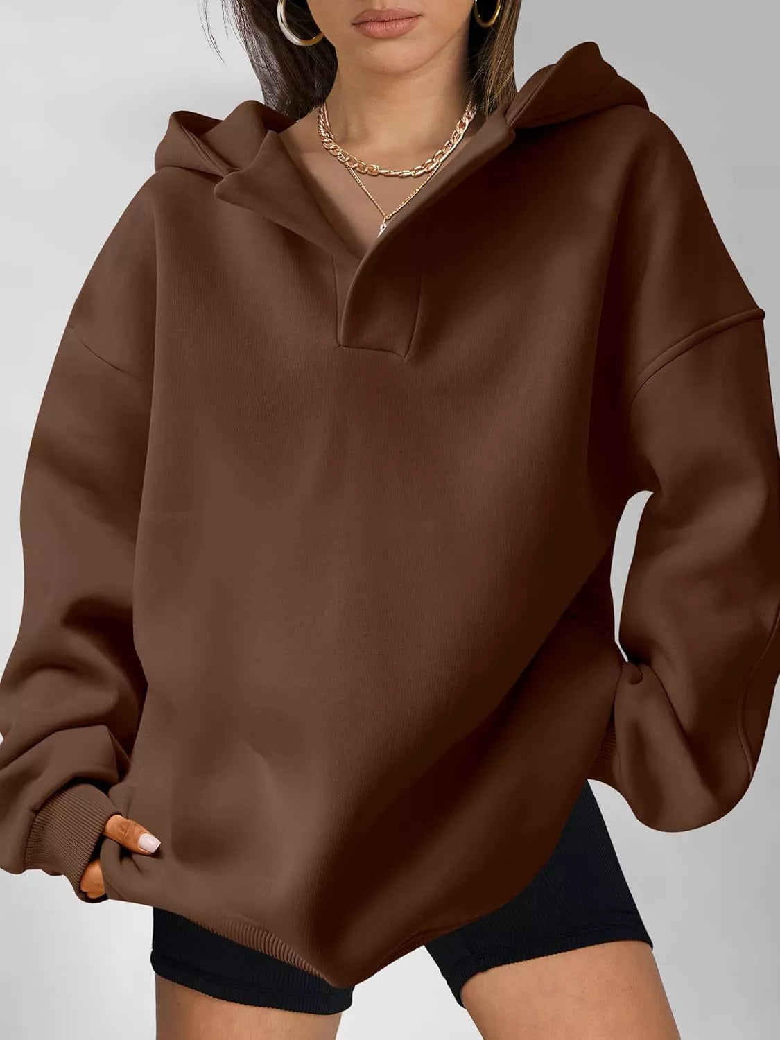 Women's oversized dropped shoulder hoodie sweatshirt in dark brown with long sleeves and relaxed fit, perfect for casual fall outfits, available in 11 colors and sizes Small–2XL.